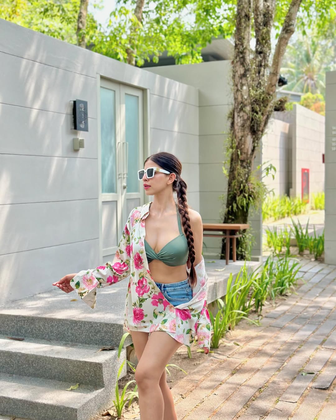 Floral Blouse, Green Bikini And Denim Shorts